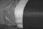 A condensation-proof cushion: The foam base is wrapped in plastic, then wrapped in polyester batting. A cover is added as the final layer.