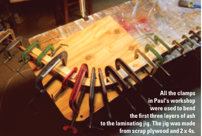 All the clamps in Paul's workshop were used to bend the first three layers of ash to the laminating jig. The jig was made from scrap plywood and 2 x 4s.