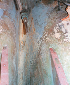 A view of the new engine beds and propeller shaft. The deep, narrow V-shape of the hull in the engine location is what created this exhausting problem.