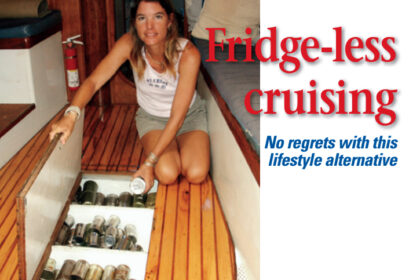 Connie shows how hatches in the cabin sole provide easy access to these cans for daily use.