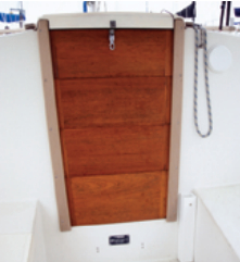 Because the companionway sill is somewhat low, the lower hatchboard is best left in place during bad weather.