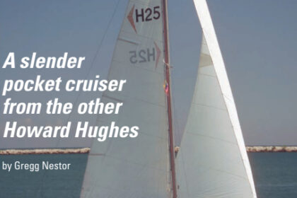 Pat McCann and S.S. Darling, a 1973 Hughes 25, hull #48, ghost along, showing a traditional and pleasing profile.