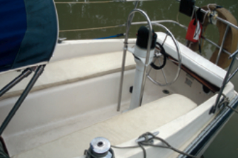 Owner Walt Pilny installed a padded seat athwartships on Whisper so he can sit down on the job.
