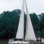 Designed by Sparkman & Stephens and built mostly during the 1970s in Canada, the Hughes-Columbia 31 was influenced by the International Offshore Rule (IOR). Pictured above is Whisper, owned by Walt Pilny of Mentor, Ohio.