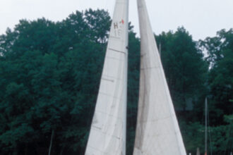 Designed by Sparkman & Stephens and built mostly during the 1970s in Canada, the Hughes-Columbia 31 was influenced by the International Offshore Rule (IOR). Pictured above is Whisper, owned by Walt Pilny of Mentor, Ohio.