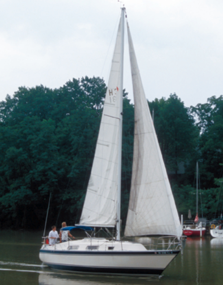 Designed by Sparkman & Stephens and built mostly during the 1970s in Canada, the Hughes-Columbia 31 was influenced by the International Offshore Rule (IOR). Pictured above is Whisper, owned by Walt Pilny of Mentor, Ohio.