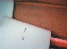 Since contact cement is unforgiving, Dale marked each piece with a name and an arrow.