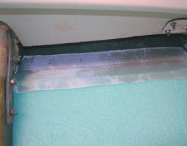 He pre-cut panels and beveled the tops to divert any leaks from the deck joint or toerail.