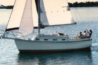 The Island Packet 27 is a handsome cutter. Its versatile rig and shoal draft make it an ideal cruiser for Florida and the Bahamas.