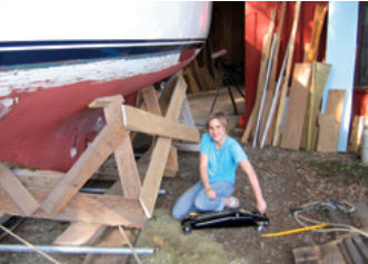 Gwen working on the boat.