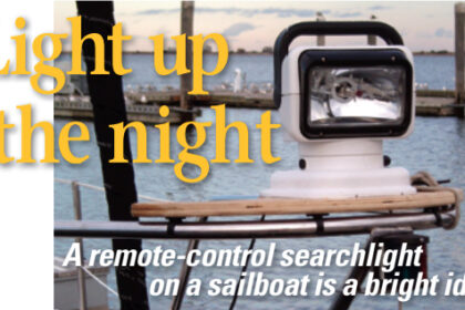 A good old boater lightened the prospect of after-dark landfalls with a portable searchlight mounting.