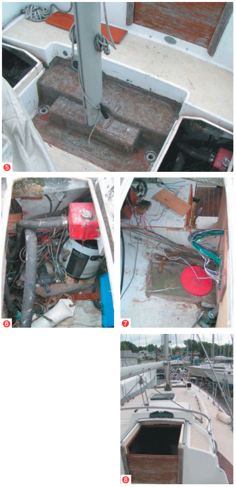 The modified mizzen mast step was one of the exterior modifications by a previous owner who, shall we say, did things his own way (5). The starboard cockpit locker shows the red engine cooling expansion tank, hot water heater, pressure water pump, and blue battery charger (6). The port cockpit locker reveals a rectangle where a battery once sat (7). The rear bulkhead had been cut away and a “wiring area” installed. The Magic Marker stuck in the hose to prevent sea water from entering the boat is an interesting touch. Opening the companionway hatch had taken Dale and his son, Eric, into a whole different world (8).