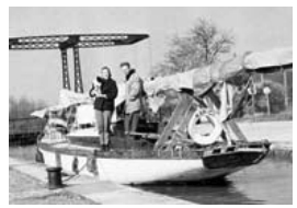 Murray, Barbara, and Bosun in the French canal system, around 1958. Kanga, built by Abeking and Rasmussen, was purchased in Denmark.