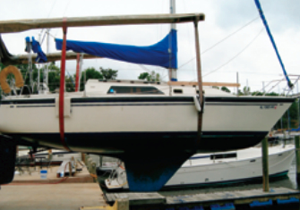 Hauled out for a scrub, the underwater profile of Liza’s fin keel and spade rudder is revealed.