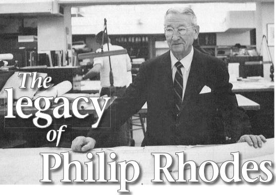 Philip Rhodes stands over a set of plans at his Lexington Avenue office in New York City.