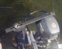 The outboard-motor/rudder connecting bar.