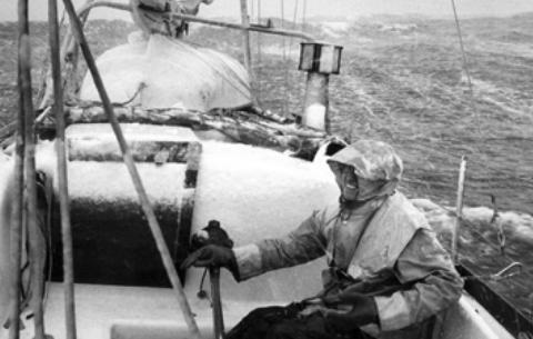 Hal in Whisper’s cockpit, at right, while rounding Cape Horn.
