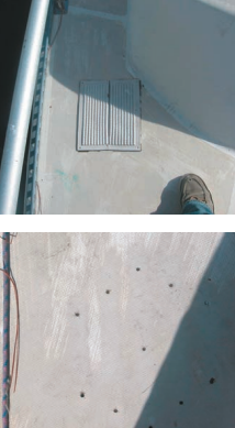 When Andrew went back to eBay for a 28-footer, things didn’t work out as anticipated. The boat was not as advertised. He was unaware of this because he had neglected to get a survey before arriving in Florida ready to assume owner ship and sail her home. This boat’s foredeck was a large bellows of spongy material. An unsightly patch hissed with each step on deck, top photo. Water sat in built-in storage areas and there were significant problems with the rudder and rudder shaft. A series of holes was drilled on the port side, bottom photo.