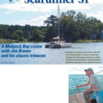 Scrimshaw at anchor in one of the creeks that border Mobjack Bay in Virginia. Jim Brown, designer of the Searunner catamarans, below, works the winches from the companionway in Scrimshaw, the boat he has owned for 34 years.