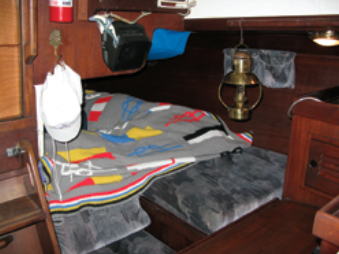 The quarter berth, located to port, is large enough for two. It shares common real estate with the navigation station.