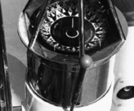 This charming binnacle houses a hybrid compass showing points (arrows) as well as a 360 ̊ card. More typically, in the era of points, cards were expressed in four 90-degree segments.