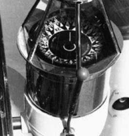 This charming binnacle houses a hybrid compass showing points (arrows) as well as a 360 ̊ card. More typically, in the era of points, cards were expressed in four 90-degree segments.