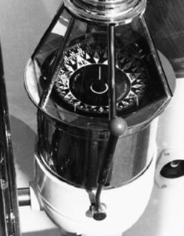 This charming binnacle houses a hybrid compass showing points (arrows) as well as a 360 ̊ card. More typically, in the era of points, cards were expressed in four 90-degree segments.