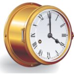Brass, primarily an alloy of copper and zinc, is less expensive than bronze and can be used for making items that remain in the cabin, such as clock and barometer cases.