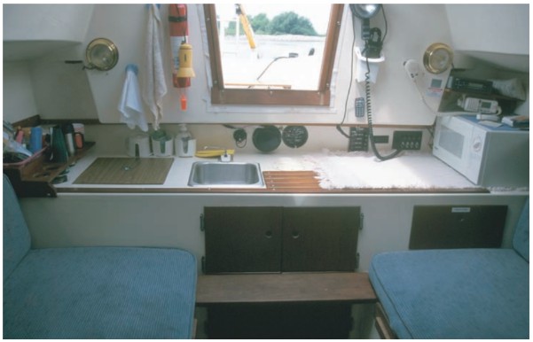 The small galley is aft under the bridge deck.
