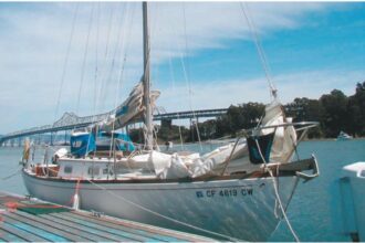 Jim Sutro’s Yankee Dolphin, Duckling, in Clipper Cove, San Francisco Bay.