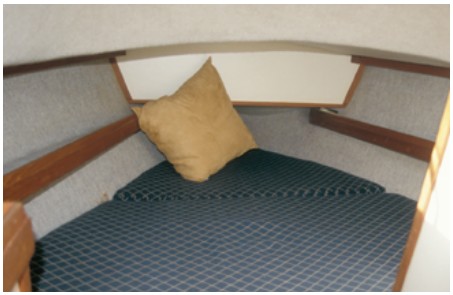 The V-berth cushion is split athwartships for easier access to the locker underneath.