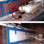 A sheet of strong poly is sealed to the area and a vacuum pump is used to supply an even clamping pressure.
