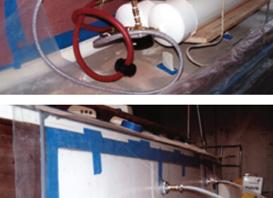 A sheet of strong poly is sealed to the area and a vacuum pump is used to supply an even clamping pressure.