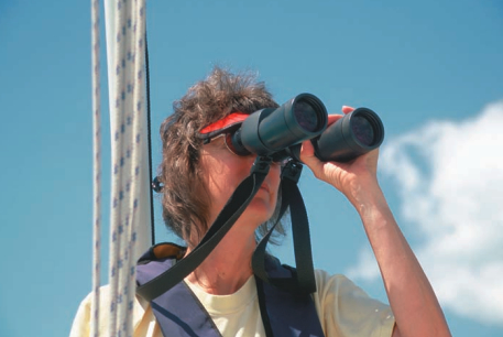 Picture of a woman using binoculars