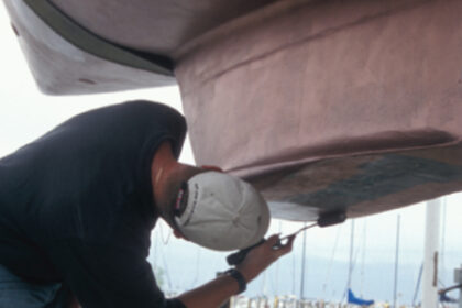 After your boat is in the slings, if your boatyard is a friendly one and you can be quick about it, apply paint in those areas that were previously inaccessible.