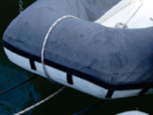 This dinghy chap design includes Velcro tabs to secure the cover to the inflatable. This option requires a compatible adhesive.