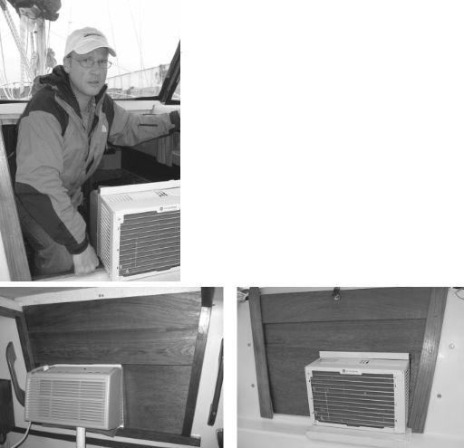 Darren Shroeger, at left, shows that it’s not impossible to share the companionway opening with a small air-conditioning unit. The unit is shown below with a view from inside and outside as it is installed in his father’s Watkins 27.