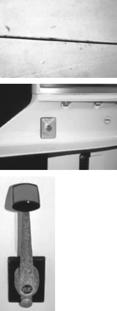 Note the rust stain seeping out from beneath the lifeline’s vinyl cover, top; corrosion of the stainless steel wire is occurring due to lack of oxygen beneath the “protective” cover. A sacrificial anode on an outboard motor, above, and a cast aluminum throttle lever showing severe pitting, at left.