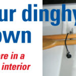 Stowed fore-and-aft across the seats, and held there by bungee cords, the dinghy’s oars are in their proper place. A pair of fairleads fastened to the forward side of the aft seat secures one cord; another pair on the aft side of the midship seat holds the other.