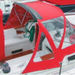 You don't have to be a seamstress to replace a dodger's window plastic. With a little work, the typical sailor can add years of life to a boat's dodger and improve the looks of the boat as part of the bargain