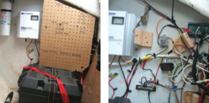 In the port cockpit locker, at left, are two flooded-cell 105Ah deep-cycle batteries. Above the batteries is a pegboard panel covering the solar and alternator regulators. An enlarged hole in the panel makes it possible to observe the status of the solar regulator. Outboard of the panel is an AC shorepower charger. All three sources of charging — solar, alternator, and AC shorepower — are together with the shortest possible cable runs. With the panel removed, at right, you can see the alternator regulator in the upper right-hand corner and the solar panel regulator to the left and down.