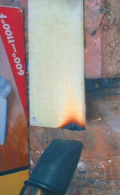 A heat gun on the 1,100° F setting charred this epoxy/fiberglass laminate, but was incapable of causing flames or glowing embers.