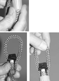 No, a SplicingNut is not someone who absolutely “loves” splicing above all else on his boat, nor is it some- one who’s been driven ’round the bend by splicing double braid. It is, instead, a two-part glass-reinforced-polymer device that has a certain nut-like appearance and can be used to form a loop in some lines. The line is wrapped around the black piece of the apparatus, as shown above and at left below. An eye, or loop, of any size can be formed in this way. Three sections of line and the black piece fit snuggly in the second piece, as shown at right below. The final construction, not shown here, brings the two pieces completely together.