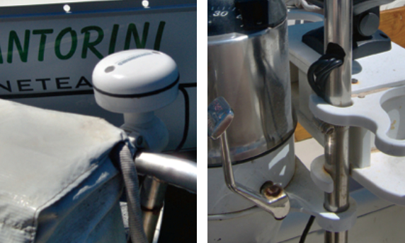 The mushroom-shaped GPS receiver is mounted on the pushpit rail near the Life-Sling case, at left. Mounting the GPS receiver was the easiest part of the job. However, threading the cables (and the large plugs at the end of each one) through the pedestal guardrail, at right, was possibly the most difficult part of the job.