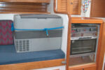 OK, so it takes up a bit of cabin space, and it’s not as elegant, perhaps, as a built-in refrigerator, but Carl points out that this costs $600, plus another $125 to hook it up and keep it in place when under way. Converting his icebox to refrigeration would have cost him closer to $6,000.