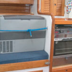 OK, so it takes up a bit of cabin space, and it’s not as elegant, perhaps, as a built-in refrigerator, but Carl points out that this costs $600, plus another $125 to hook it up and keep it in place when under way. Converting his icebox to refrigeration would have cost him closer to $6,000.