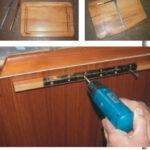 The advantage of a swing-up counter is that it will disappear when not needed. Gregg increased the counter space in his Pearson 28-2 by 50 percent with the addition of this 14- by 23-inch swing-up counter. Notice, at left, that the spacer allows room between the cutting board and the galley cabinet for the brace when folded.