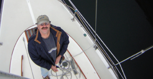 Gary Stoop tails for Richard as he nears the spreaders. Gary is one happy fellow because he isn’t the guy up the mast.