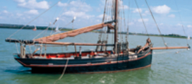 Old gaff-rigged cutters that once worked for a living are still commonly used as cruising boats in Great Britain. This well-maintained example cruises out of the River Medway in the Thames Estuary on the southeast of England.