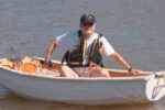 Picture of a man in a dinghy